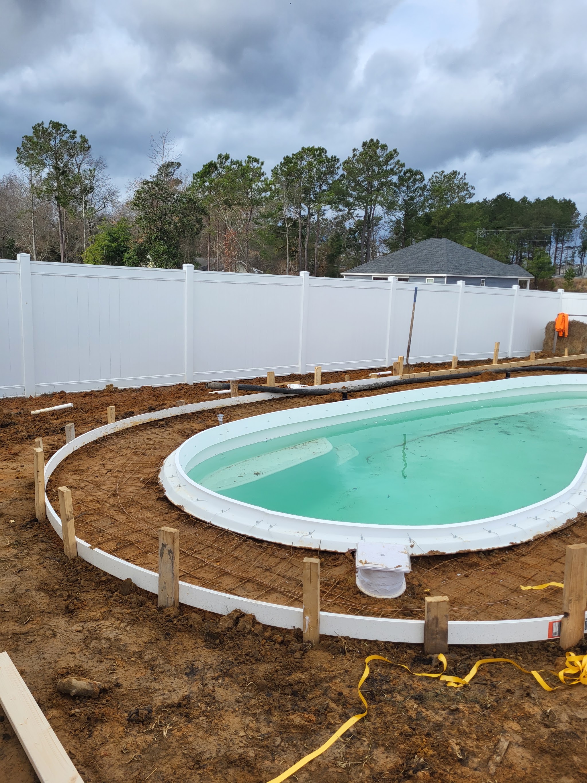 Fibreglass pool shell set in a prepared excavation
